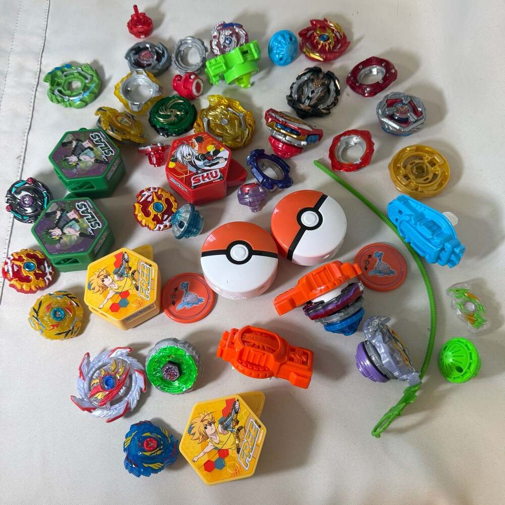 Large Lot of Hasbro Beyblade Burst Tops, Launchers, and Accessories